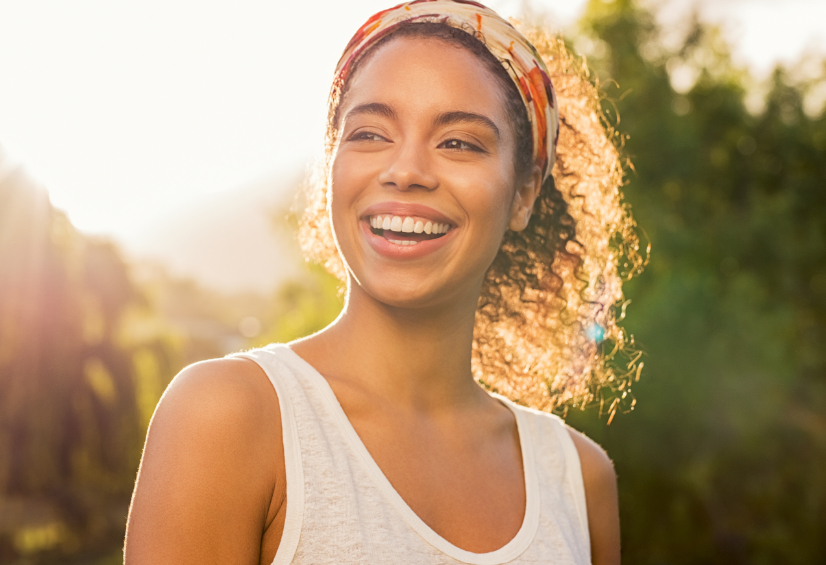 Woman smiling in the sunshine